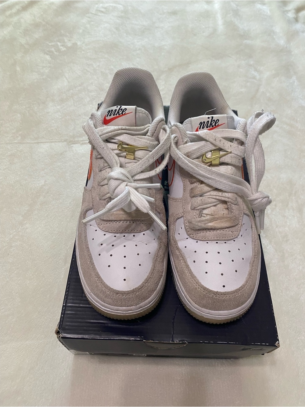 Nike White and Tan Low-Top Sneakers with Orange Swoosh